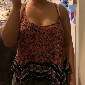 A flowered pink tank top